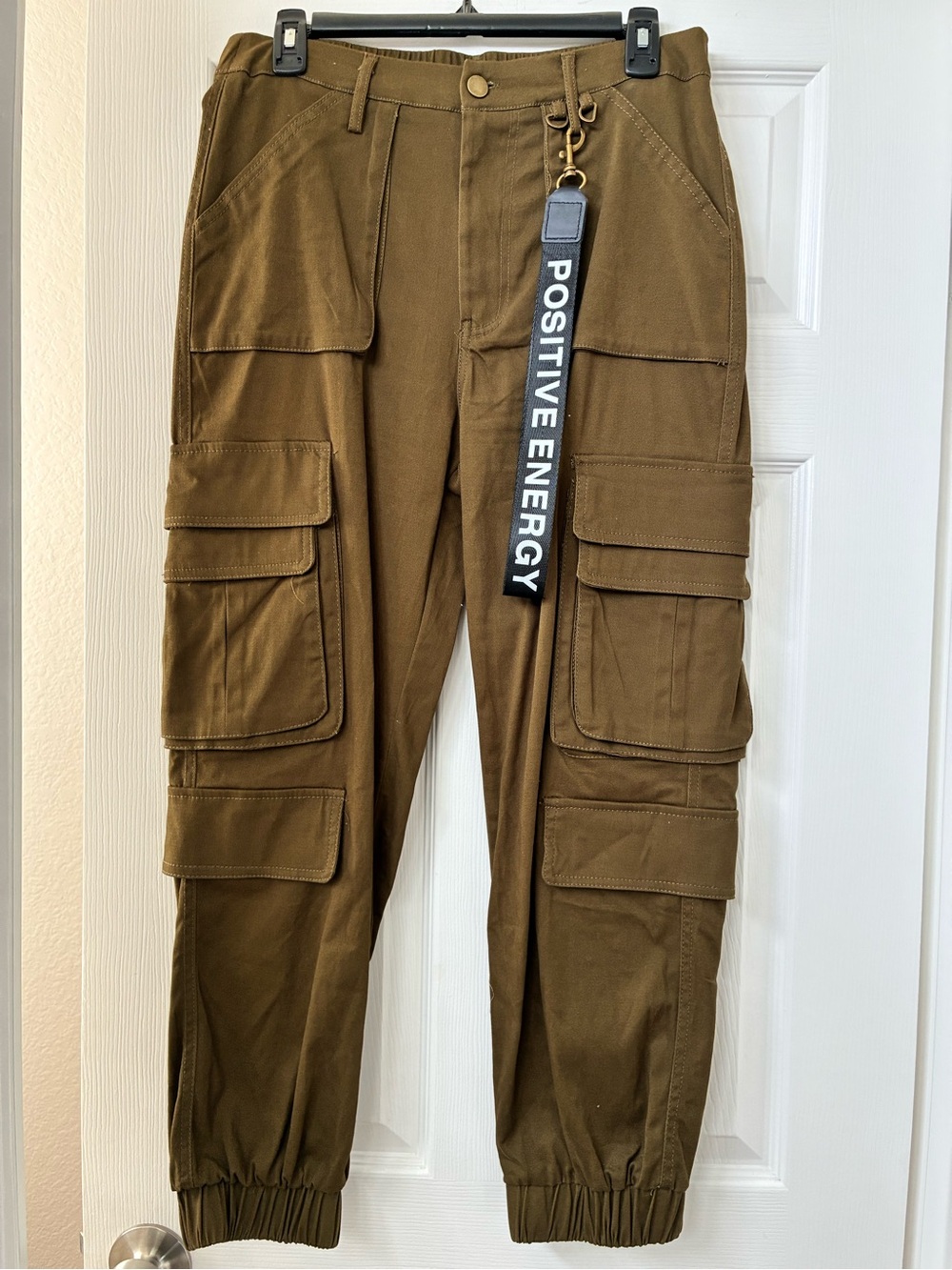 Charlotte Russe Olive Green Cargo Joggers with 'Positive Energy' Keychain